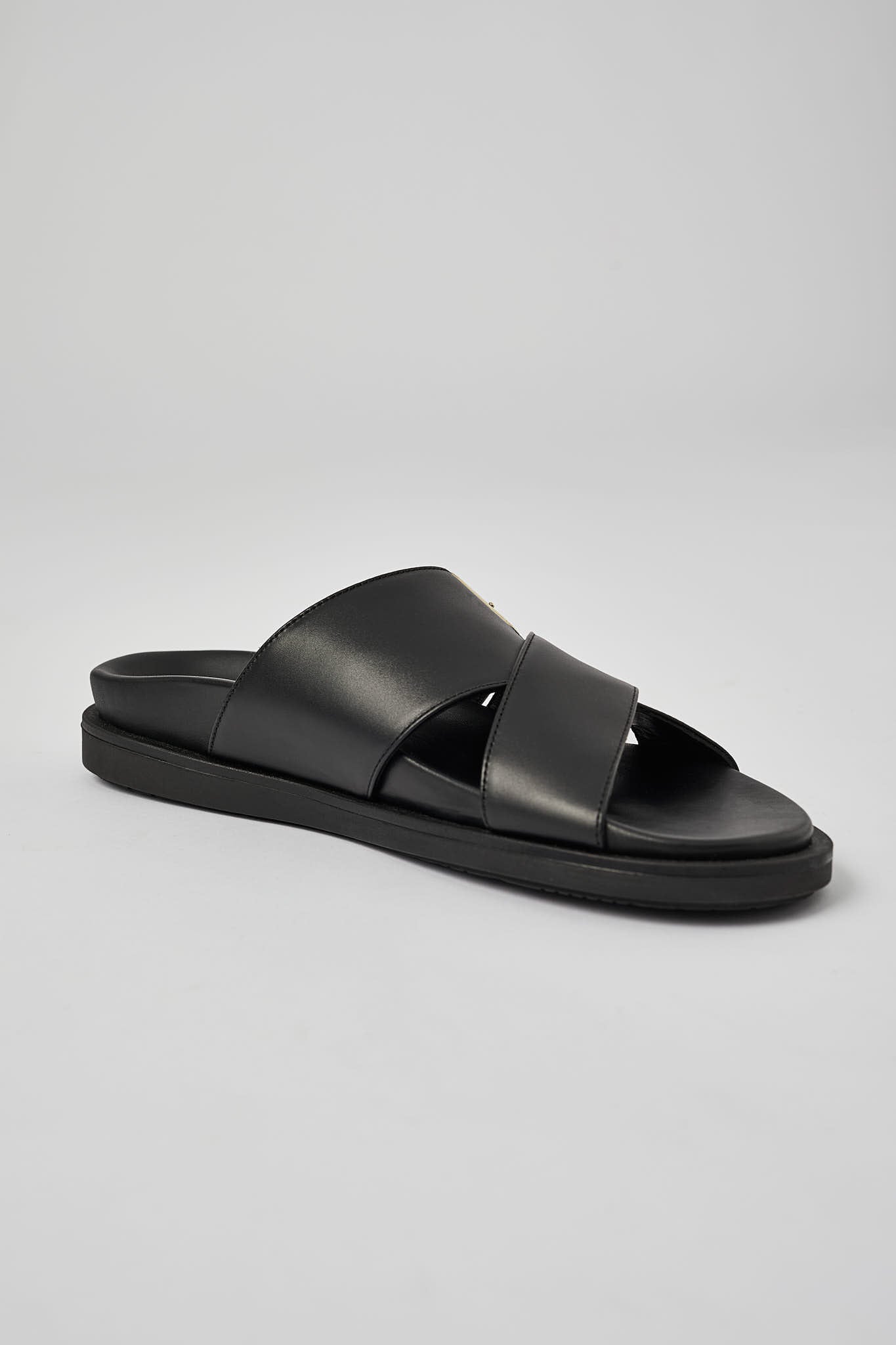 Black Llafranc leather sandal side view with open-toe design
