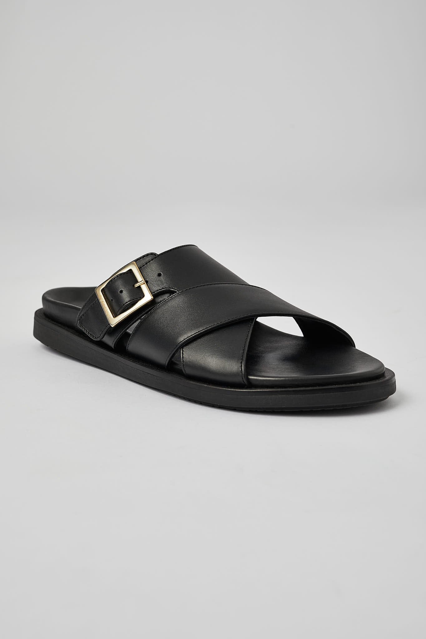 Black Llafranc men’s leather sandals angled view with secure buckle