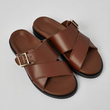 Brown Llafranc men’s leather sandals angled view with buckle