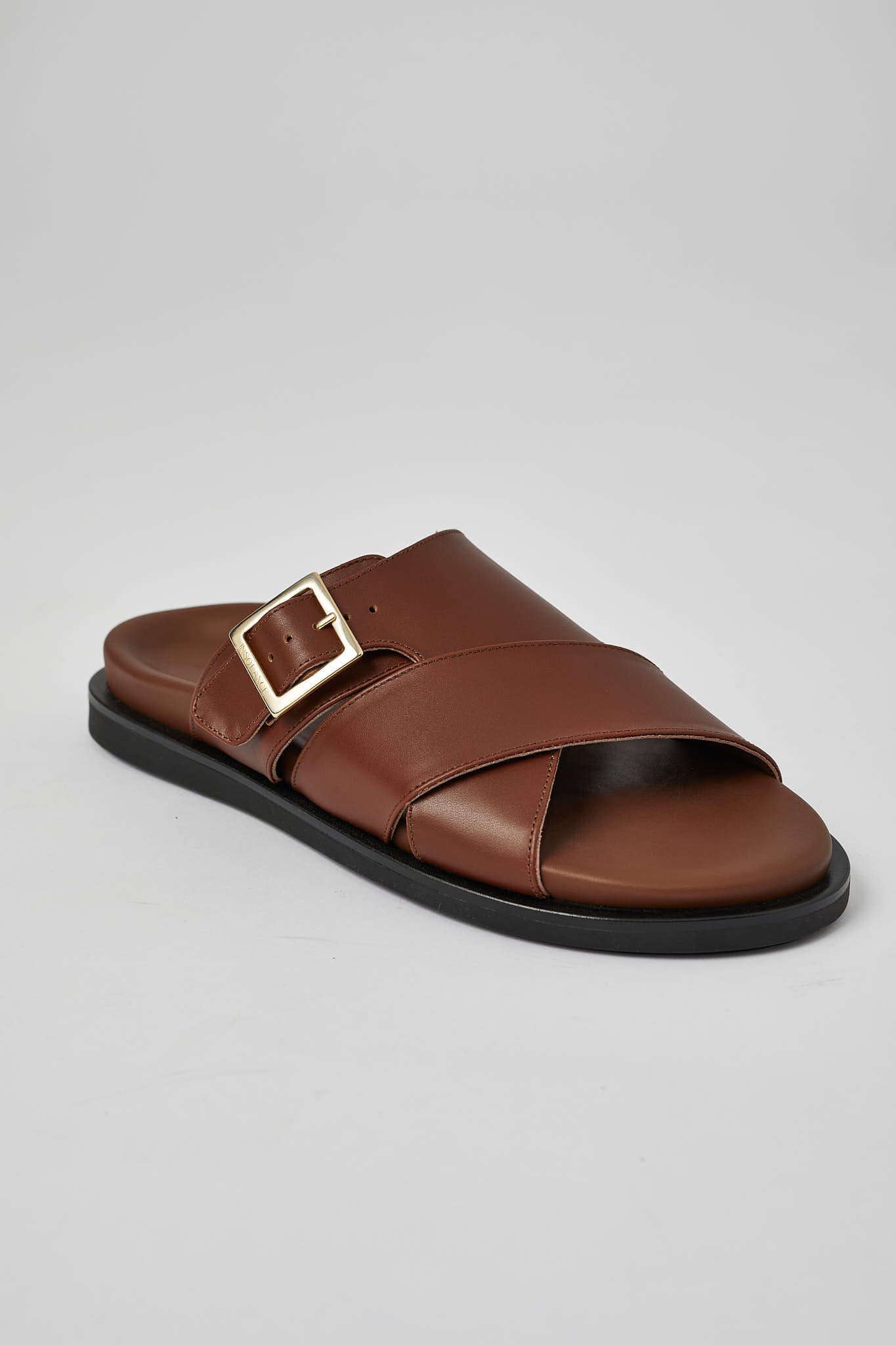 Brown Llafranc leather sandal profile with adjustable buckle