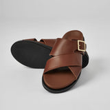 Brown Llafranc leather sandal with black sole and personalized insole