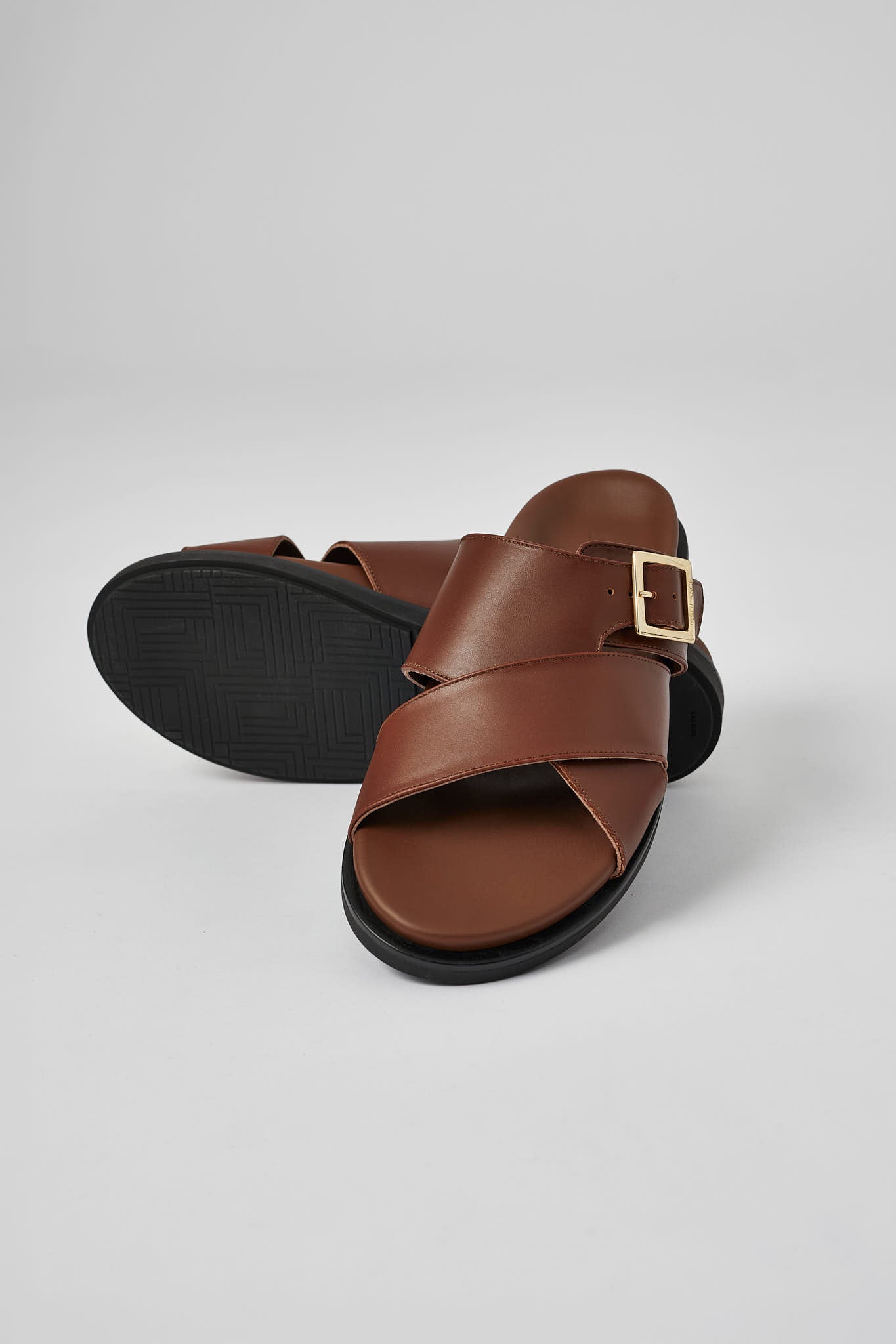 Brown Llafranc leather sandal with black sole and personalized insole