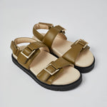 Olive Barna leather sandal side view with gold buckle detail