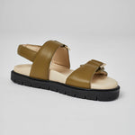 Close-up of olive Barna leather sandal with gold buckle and sole