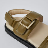 Olive Barna leather sandals angled view with gold buckles