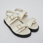White Barna leather sandal side view with gold buckle detail